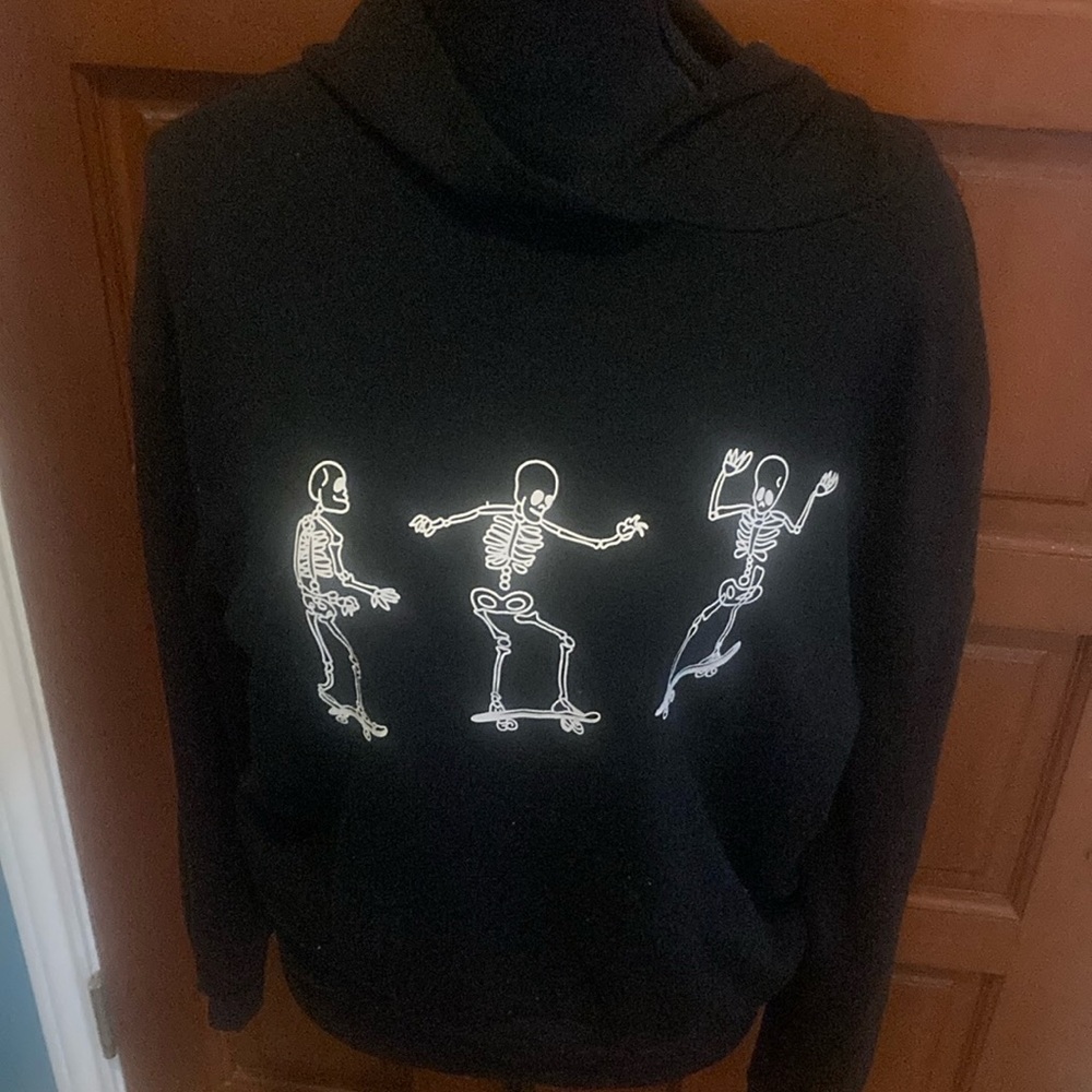 Black hooded sweatshirt.